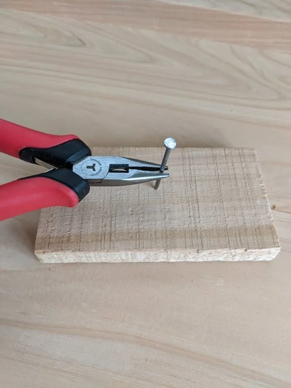 Pliers holding nail 2.jpg