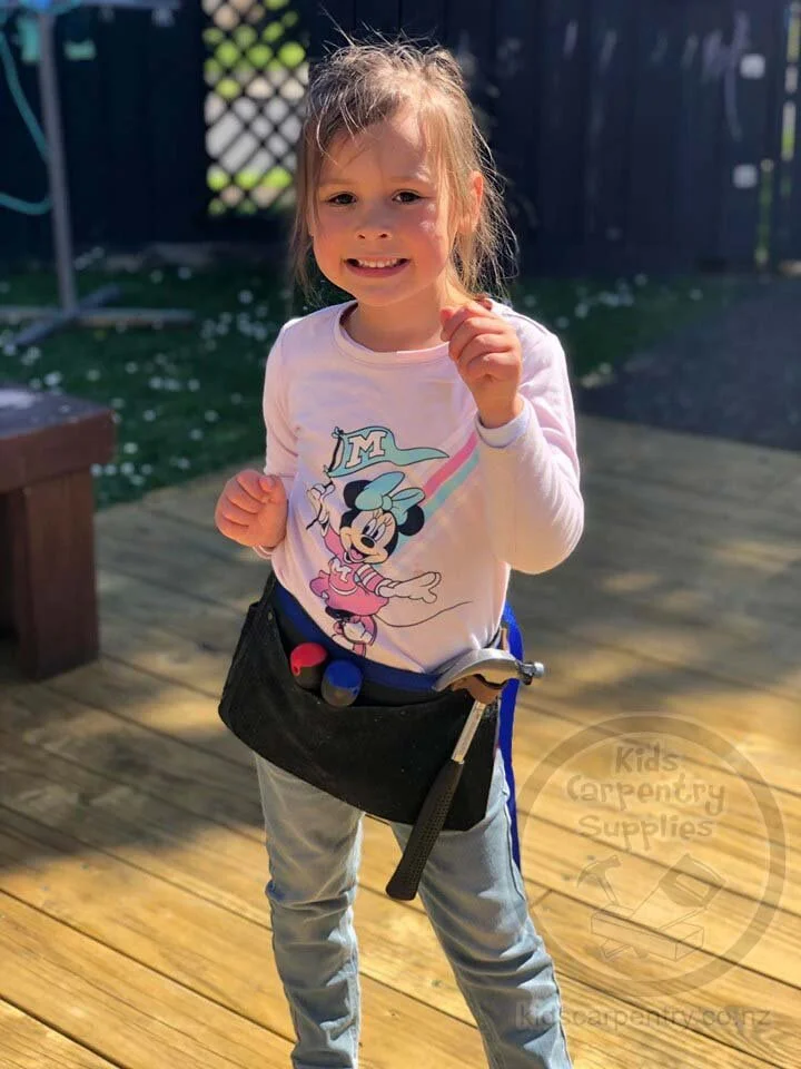 Girl Wearing Tool Belt