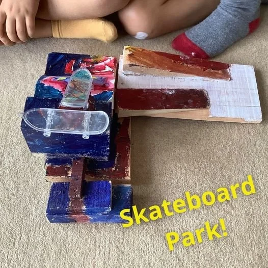 DIY skateboard park with ramps made from wood offcuts for mini finger skateboards