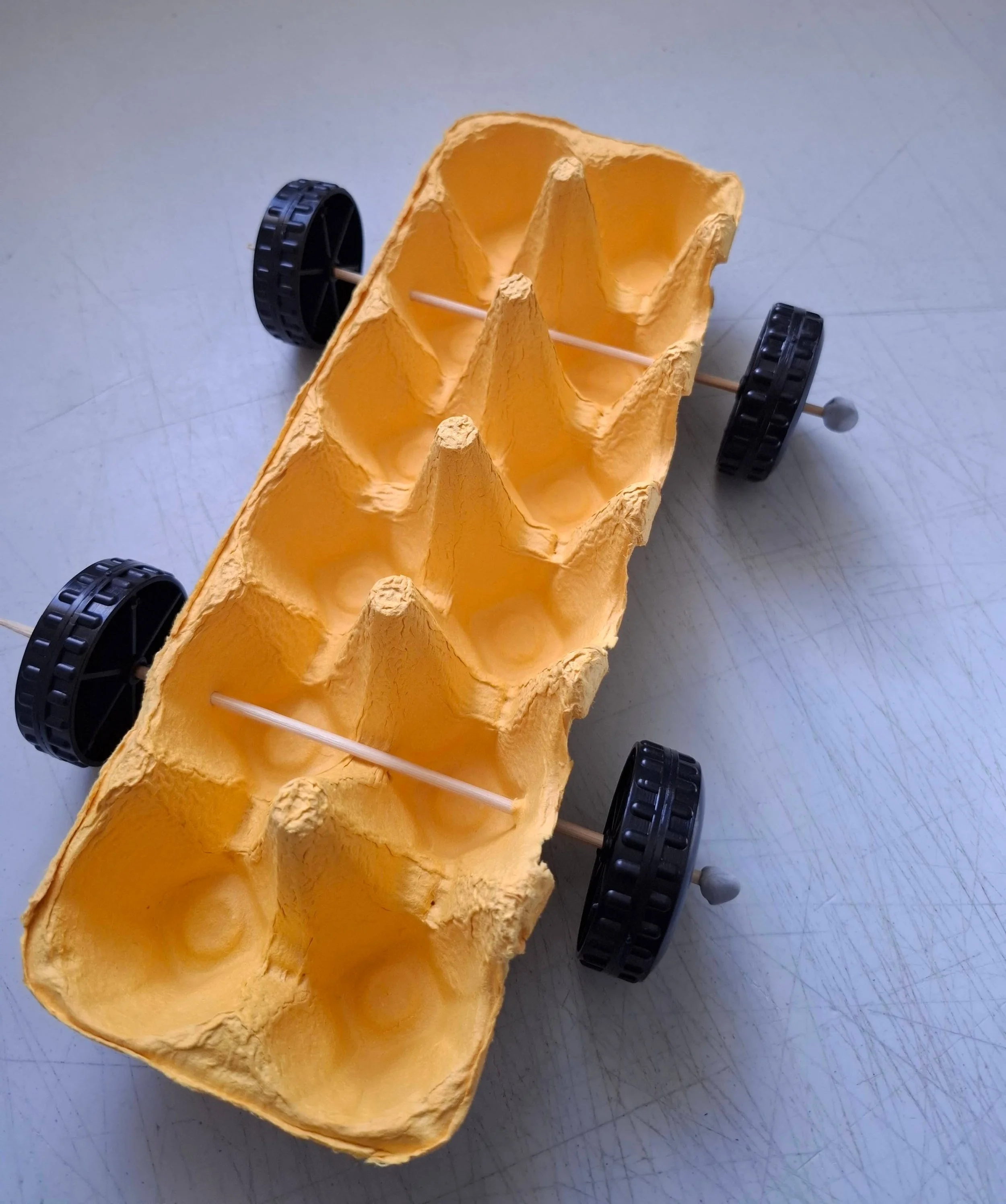 Racing car kids craft idea made with recycled egg carton and plastic toy wheels619_131925.jpg