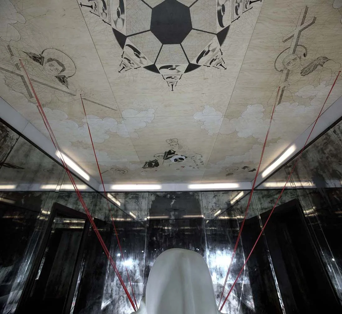 Reckoner , 2009. (ceiling detail) Wood, mirror, pencil, pen, paint, ribbon, hydraulic system, water. 12' x 16' interior.