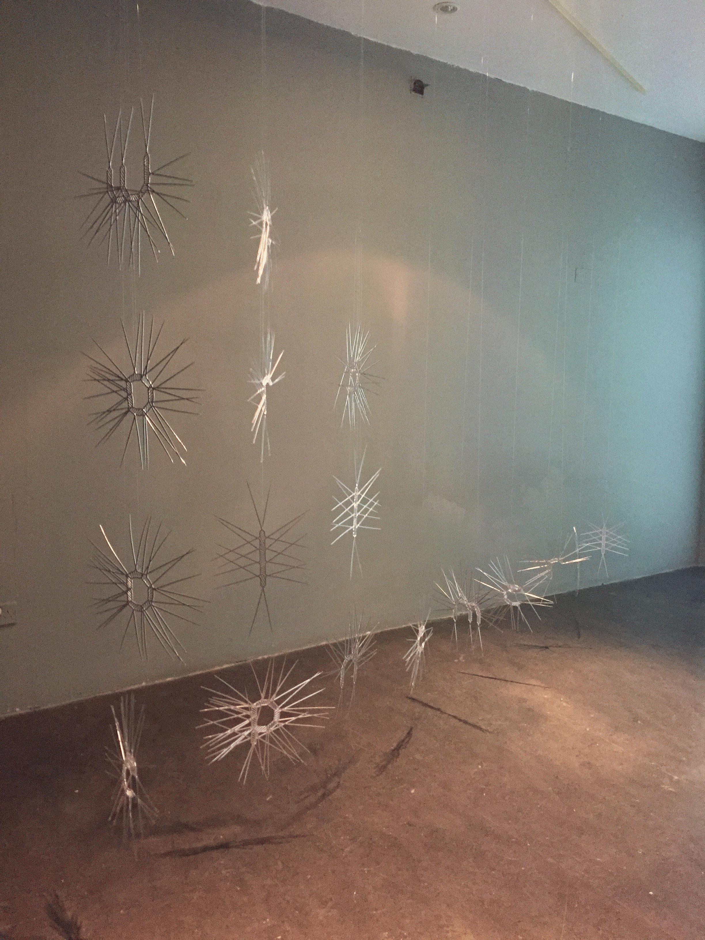 We Are All Ephemeral, 2015. (detail) Curtain of customized lasercut mirrored acrylic letters. Variable Dimensions.