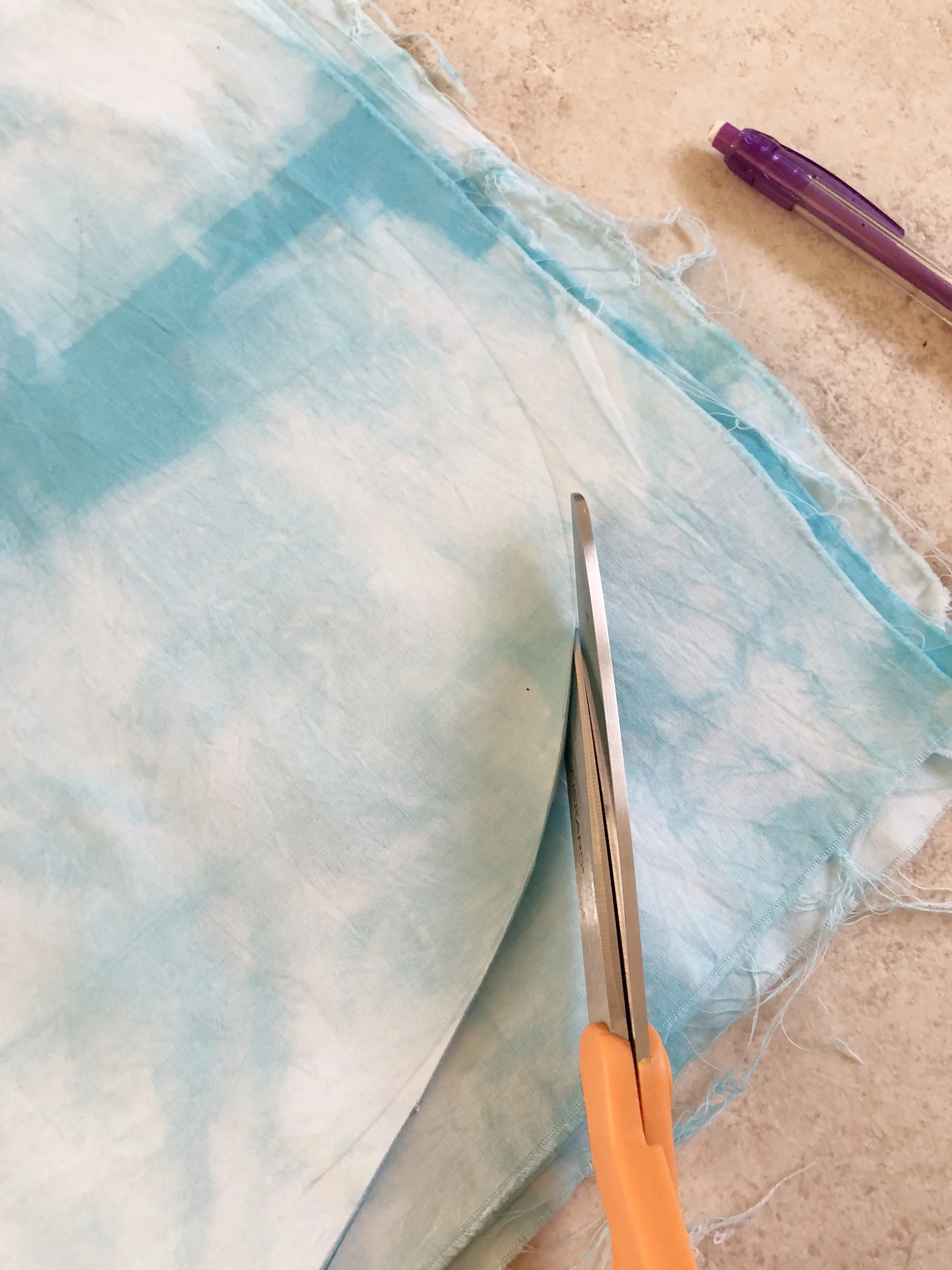 Once your line is drawn, cut all four layers at once.