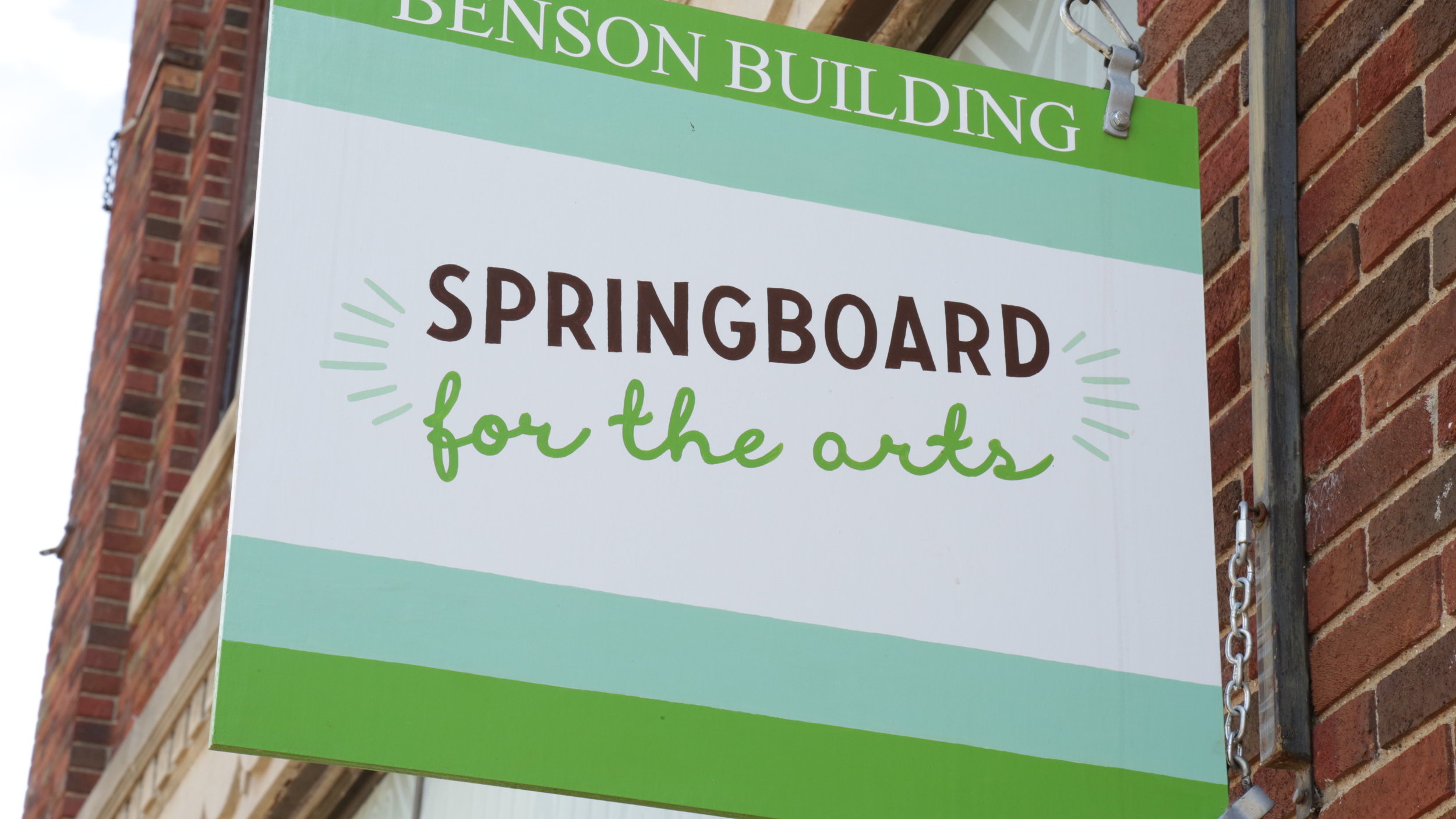 Springboard sidewalk signage