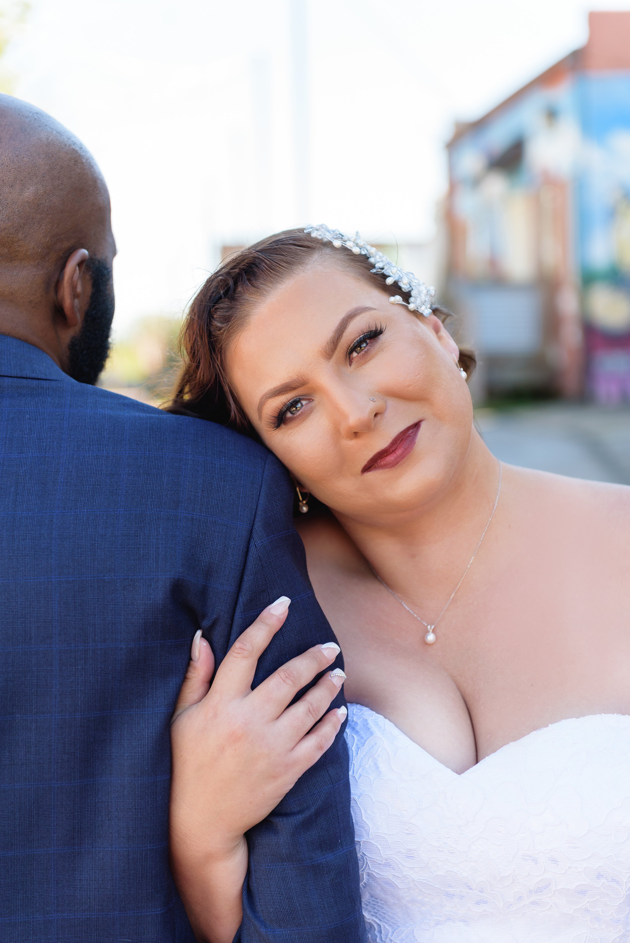 Bride and Groom in Downtown Hapeville, Georgia after their first look photos on wedding day