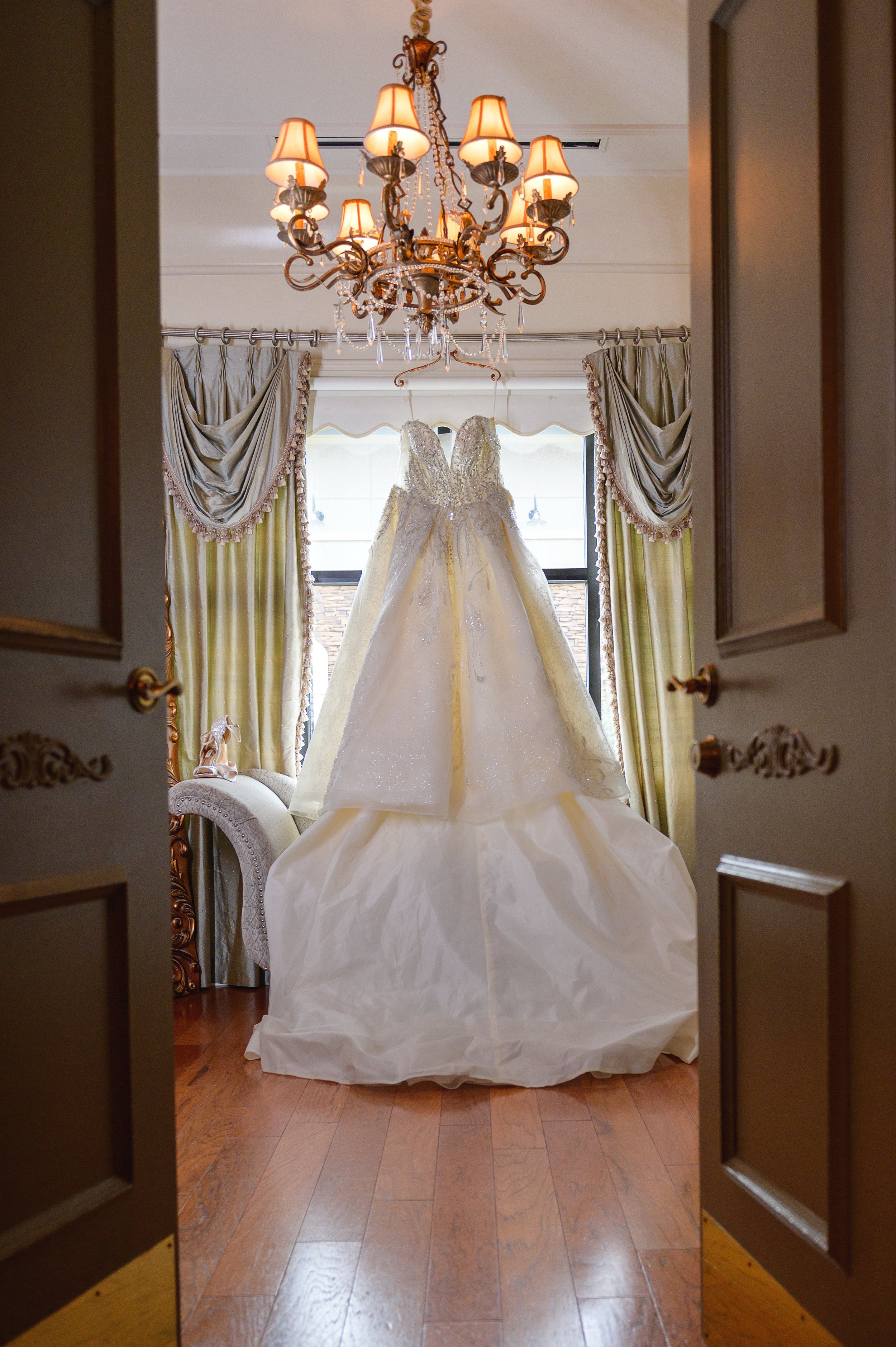 Ballroom Princess Gown hung in the bridal suite of Spring Hall Event Venue for a wedding