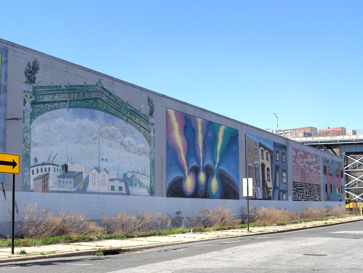  The row of five murals along the exterior wall of the Universal Folding Box building. Due to the passage of time, I don’’t recall the names of most of the artists involved in this project, except for the 3rd (brown stone facades), which was painted 
