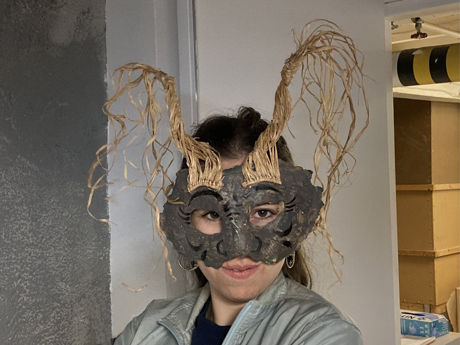  Straw Mask, 2022. Paper mache and raffia. Approx.: 14” high. 