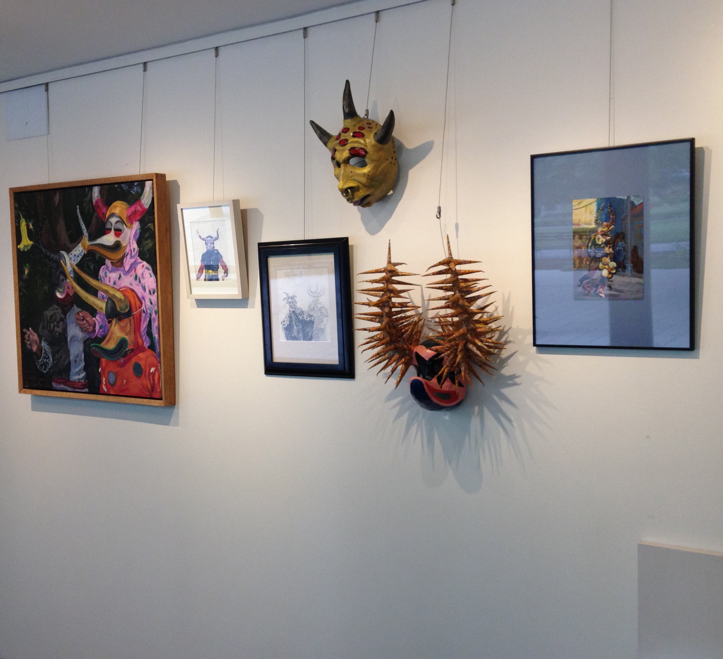  Installation photo with carnival masks, Queens Botanical Garden solo show, 2nd view, 2016. (Mask with spiked horns made by an unidentified craftsman.) 
