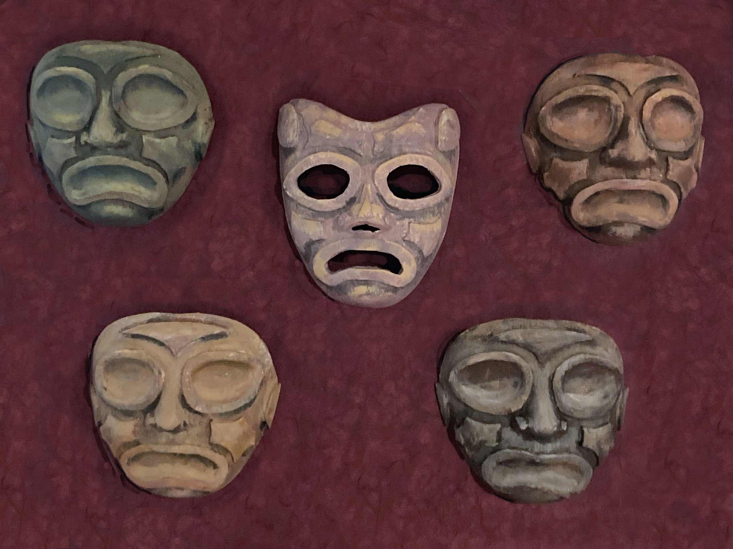  Installation concept:   Taíno Mask with four blind masks,   2024. Mixed media. 