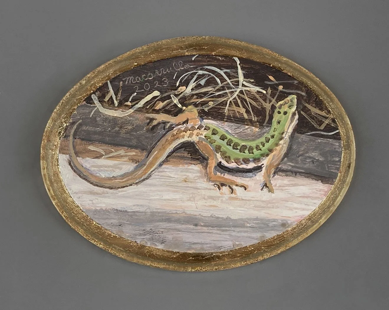    Lizard,   2023. Acrylics on wood with gold leafed border. 4.5” X 5.5” 
