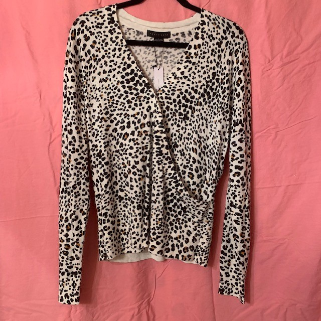 Just a little bit more fun than your typical V-neck! You can pick up the $99 Sanctuary XOXO Leopard Sweater now at Venue!