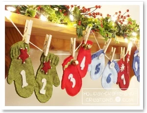 Inspiration photo. The customer requested a "hanging mittens" style of advent calendar as shown in this photo but in custom colours of cream, white, silver, and gold.