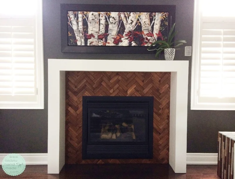 DIY fireplace renovation, DIY fireplace makeover, DIY modern fireplace, DIY home renovation project, DIY home reno, modern home design, modern home projects, painted fireplace, painted fireplace mantel, chevron tile design, chevron tile on fireplace, herringbone tile design, herringbone tile on fireplace, DIY chevron tile, DIY herringbone tile, herringbone tile pattern, wood tile, fireplace uplift, DIY fireplace transformation, modern home, bidziu handmade, bidziu hand made