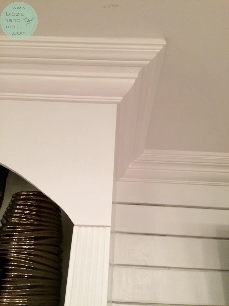 DIY built-in shelving unit, DIY built-ins, DIY built-ins around fireplace, DIY fireplace facelift, DIY basement reno, DIY basement project, DIY fireplace reno, build your own shelving unit, DIY custom made built in shelves, DIY custom built-ins, custom built-ins, DIY crown moulding installation, build your own shelves, fireplace facelift, fireplace renovation, bidziu handmade, bidziu hand made