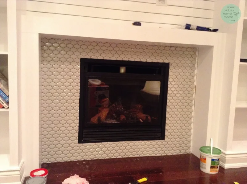 DIY built-in shelving unit, DIY built-ins, DIY built-ins around fireplace, DIY fireplace facelift, DIY basement reno, DIY basement project, DIY fireplace reno, build your own shelving unit, DIY custom made built in shelves, DIY custom built-ins, custom built-ins, DIY crown moulding installation, build your own shelves, fireplace facelift, fireplace renovation, bidziu handmade, bidziu hand made