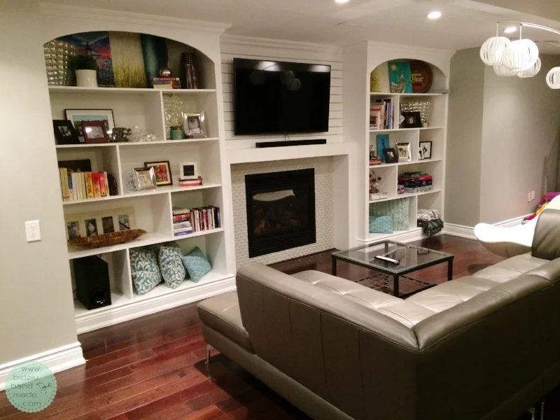 DIY built-in shelving unit, DIY built-ins, DIY built-ins around fireplace, DIY fireplace facelift, DIY basement reno, DIY basement project, DIY fireplace reno, build your own shelving unit, DIY custom made built in shelves, DIY custom built-ins, custom built-ins, DIY crown moulding installation, build your own shelves, fireplace facelift, fireplace renovation, bidziu handmade, bidziu hand made