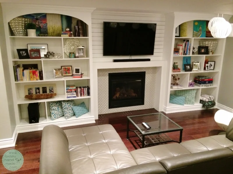 DIY built-in shelving unit, DIY built-ins, DIY built-ins around fireplace, DIY fireplace facelift, DIY basement reno, DIY basement project, DIY fireplace reno, build your own shelving unit, DIY custom made built in shelves, DIY custom built-ins, custom built-ins, DIY crown moulding installation, build your own shelves, fireplace facelift, fireplace renovation, bidziu handmade, bidziu hand made