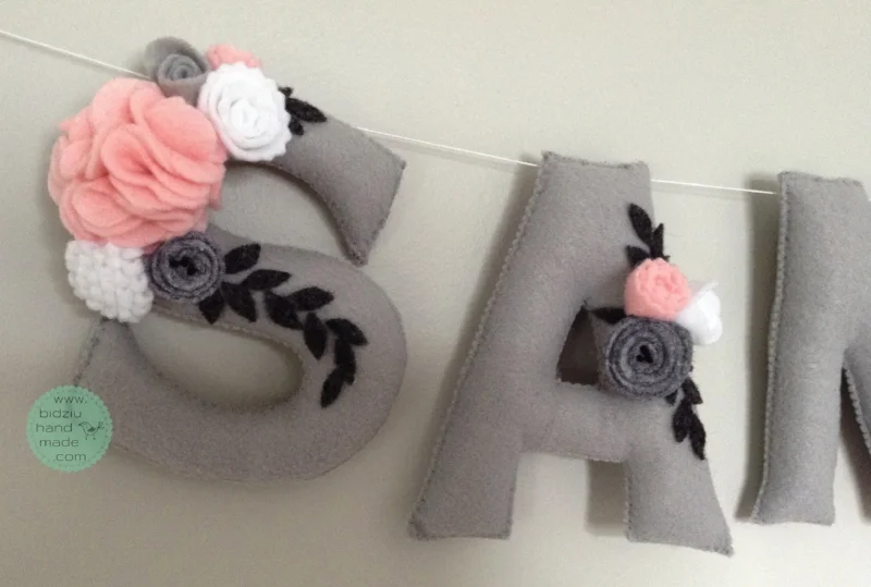 felt name banners, name banners, banners, flag banners, felt flag banners, girl's name banner, boy's name banner, nursery decor, kid's room decor, modern home decor, trendy nursery, trendy kid's room, pink and gray name banner, custom name banner, DIY room decor, DIY name banner, handmade name banner, bidziu handmade, bidzuhandmade, baby gift ideas, floral name banner, white and gray name banner, shabby chic room decor, 
