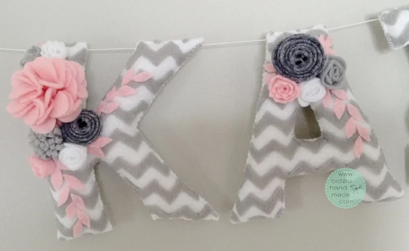 felt name banners, name banners, banners, flag banners, felt flag banners, girl's name banner, boy's name banner, nursery decor, kid's room decor, modern home decor, trendy nursery, trendy kid's room, pink and gray name banner, custom name banner, DIY room decor, DIY name banner, handmade name banner, bidziu handmade, bidzuhandmade, baby gift ideas, floral name banner, white and gray name banner, shabby chic room decor, chevron name banner
