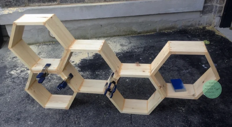 honeycomb shelves, honeycomb shelving unit, DIY honeycomb shelves, DIY honeycomb shelving unit, DIY shelves, DIY hexagonal shelves, DIY wood working, DIY furniture, wood working project, modern shelves, modern shelving unit, trendy shelves, trendy shelving unit, DIY trendy shelving unit, DIY trendy shelves, modern home decor, trendy home decor, DIY home projects, unique shelves, unique shelving unit, modern home accents, trendy home accents, DIY projects, DIY home decor, bidziu handmade, bidziu hand made