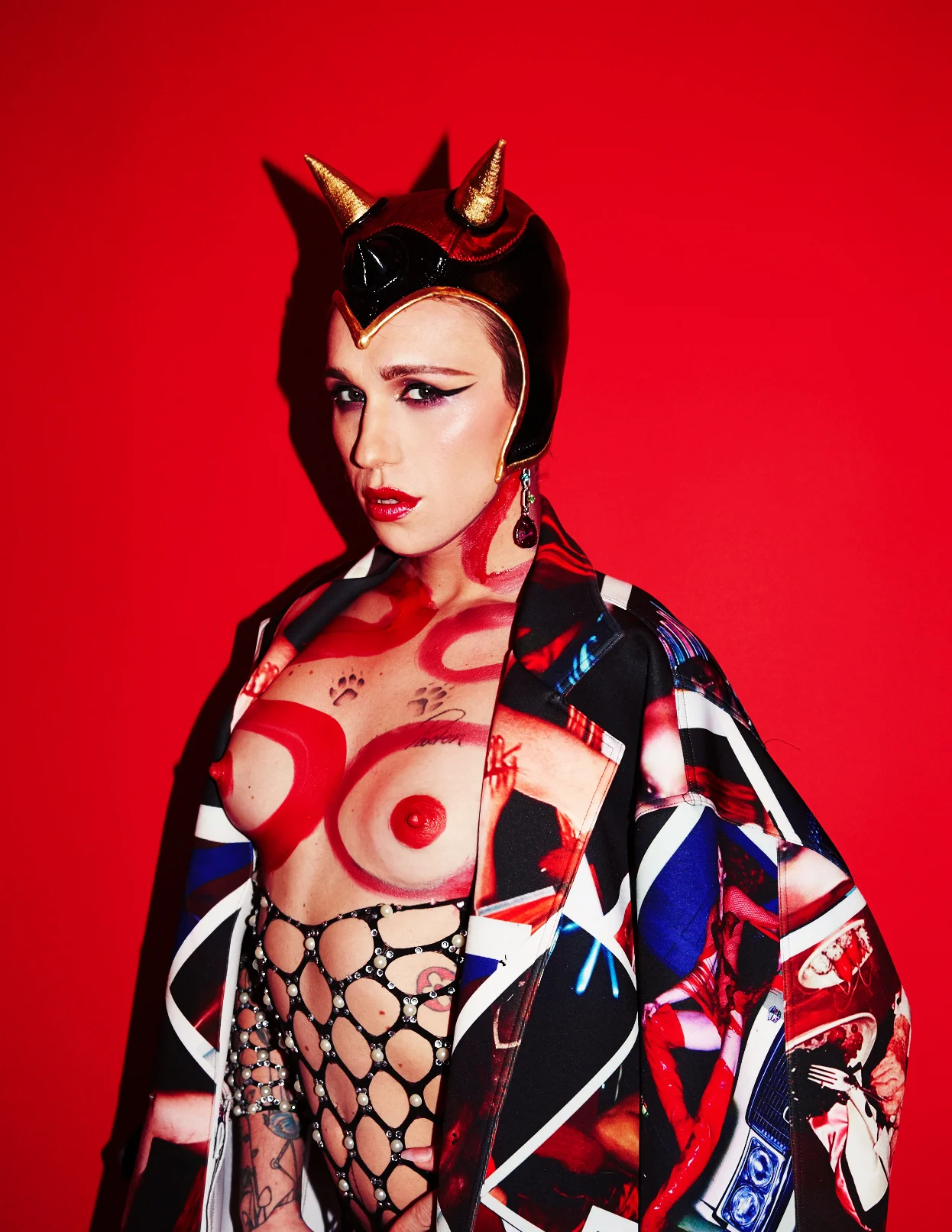 Clothing: BCALLA and Casey Caldwell Photography: Eric T. White Makeup: Slater Stanley Painter: Mickey Montgomery Model: Bailey Stiles Origami: Daniel Vi Li Headpieces: Dick & Virgil PAOM x Slather Factory Paper Magazine