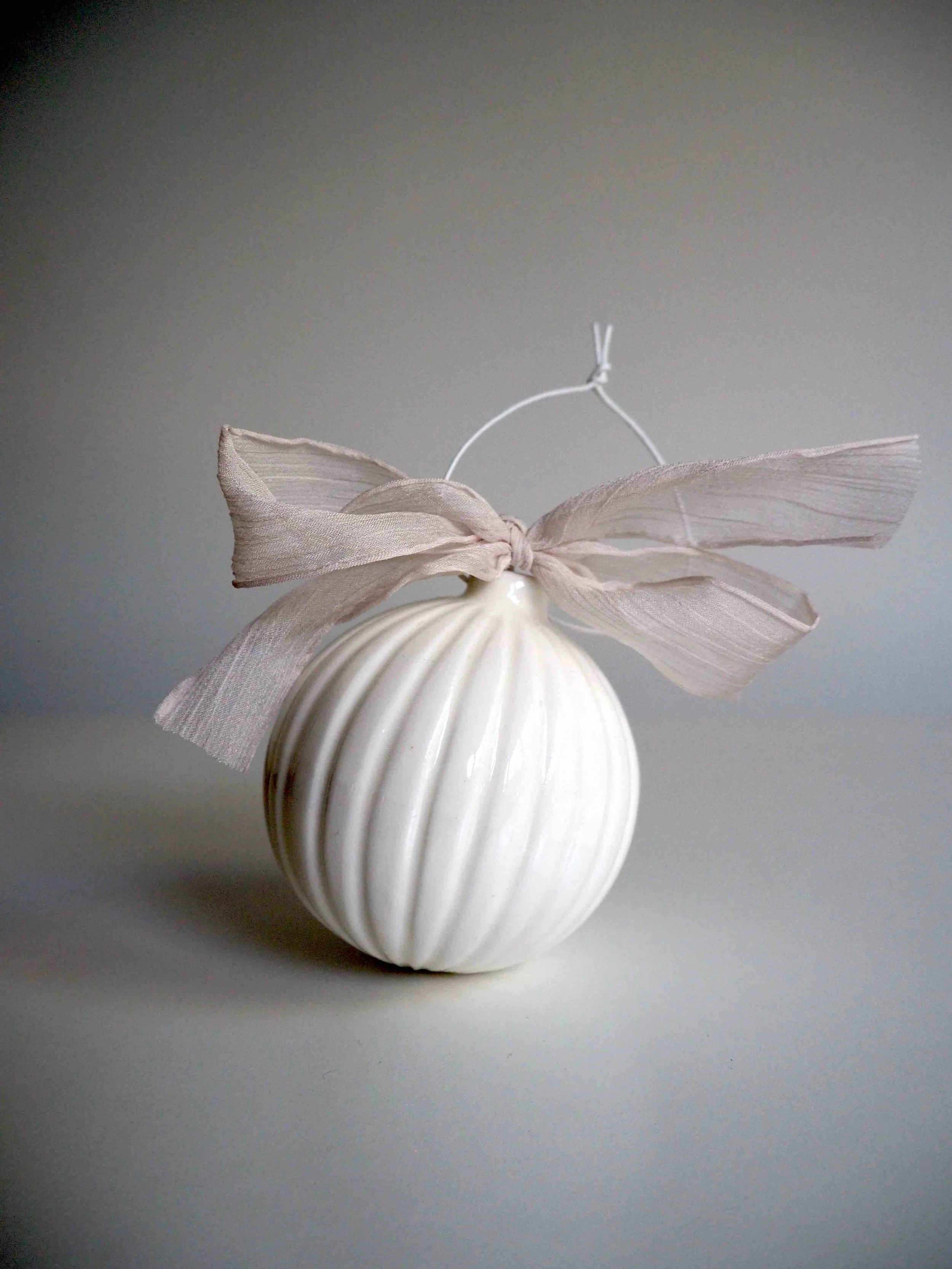 GOST_Lucy Ings_Bauble cream:white simple carved pattern_low res.jpg