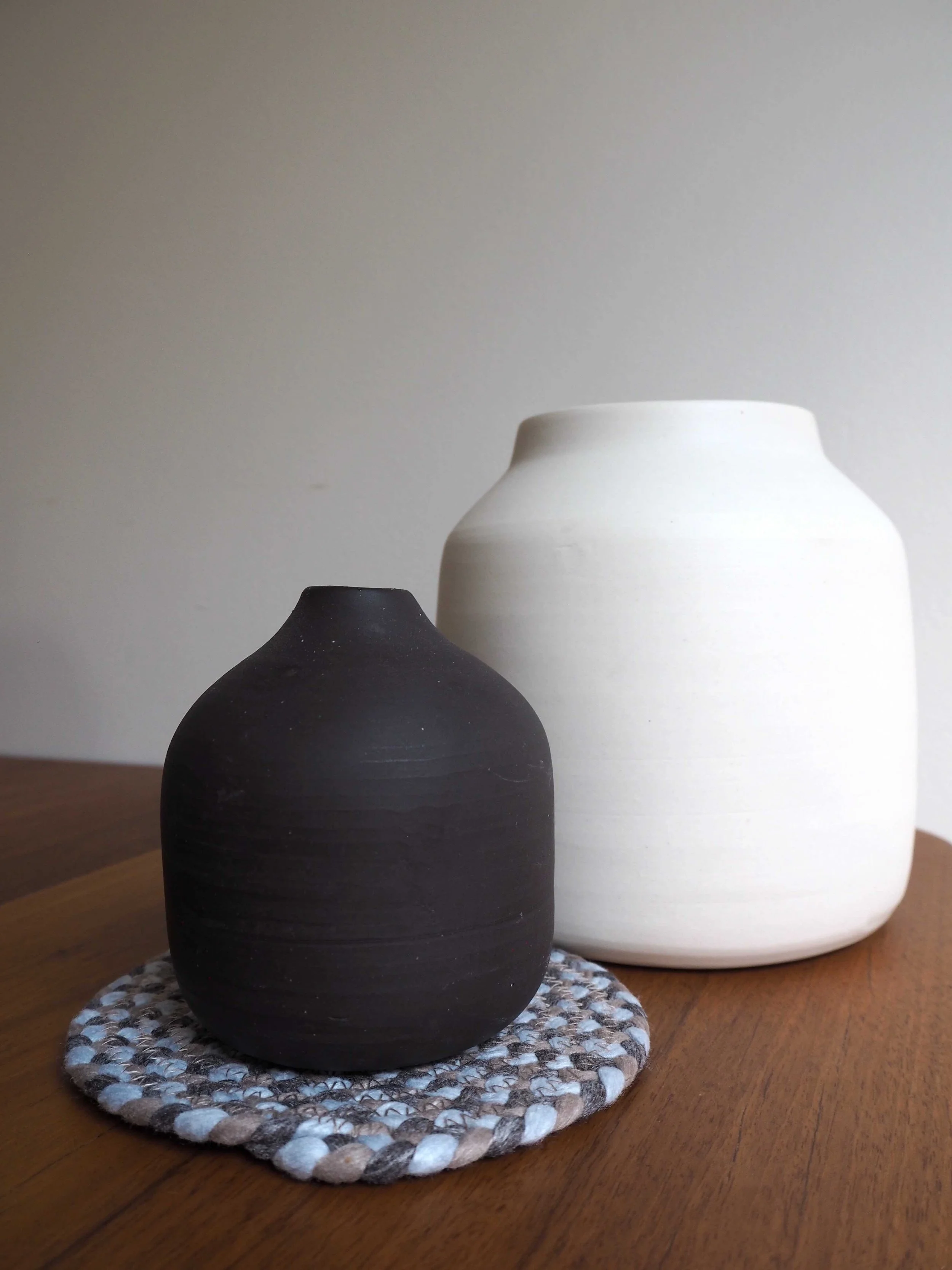GOST_Elph_white large vase with small narrow black vase on mat_low res.jpg