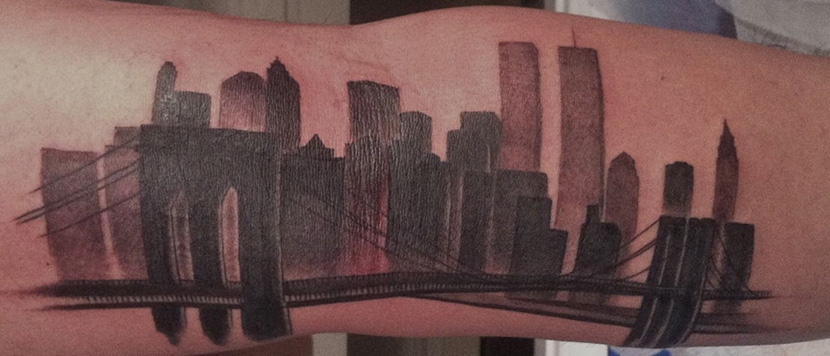  city skyline tatoo arm 