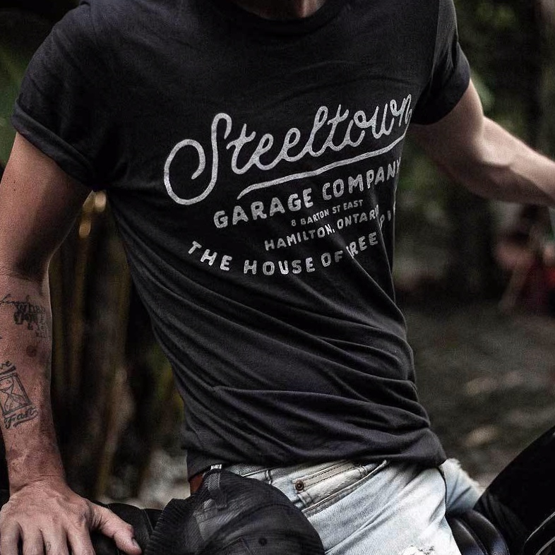 Script-Tee-DarkGrey-Steeltown-Garage-Jeff-1_2048x2048+copy.jpg