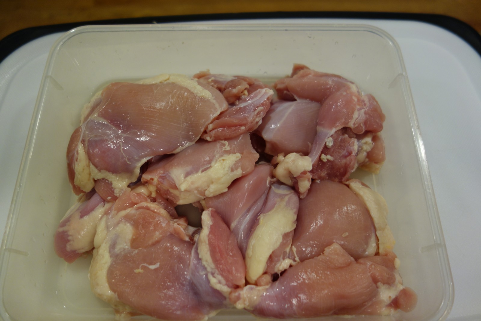Pat the chicken thighs dry before adding Yakitori sauce.