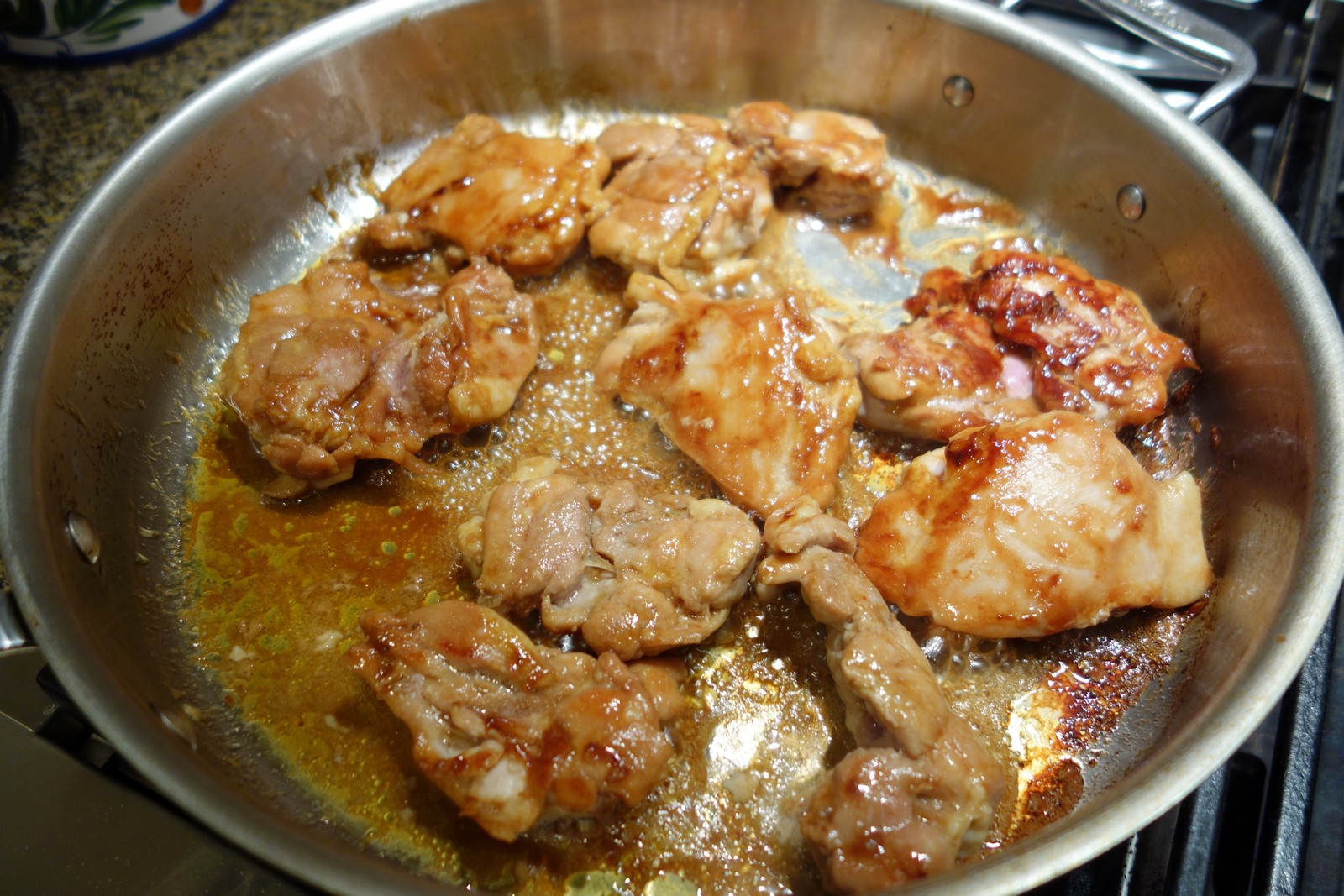 Cook the chicken over medium high heat about 10 minutes before adding green onions. This is a non-non-stick pan, otherwise known awkwardly as a stick pan.