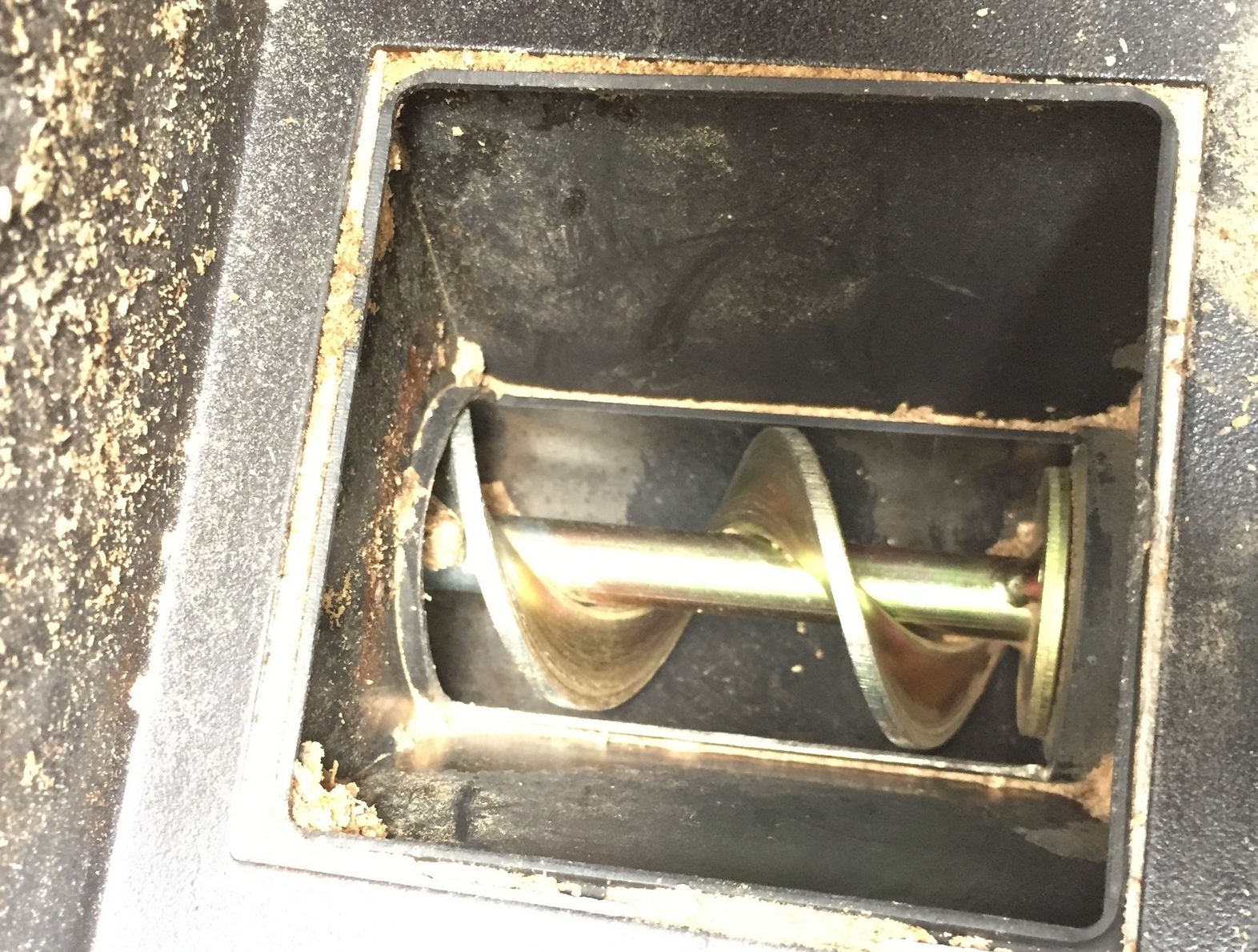 Pellet grills use an auger to feed hardwood pellets into the fire-pit. 