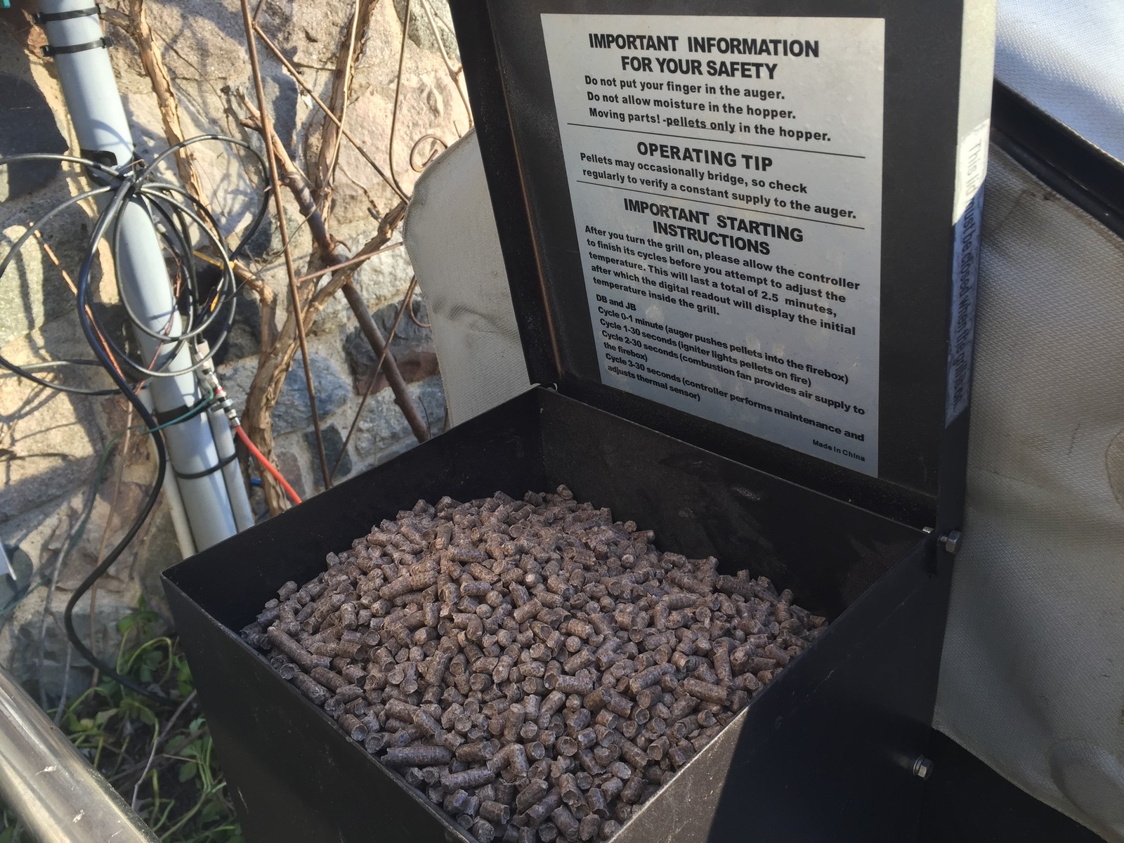 Just fill the hopper with pellets. This is the Daniel Boone hopper, which holds enough for a very long smoke, or numerous shorter smokes.