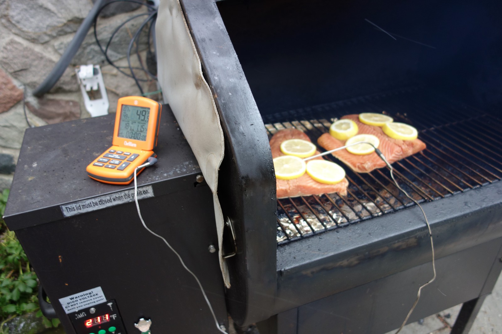 I didn't want to open the smoker lid and cause a stall mid-cook, so I made sure to hook up my cooking alarm so I could monitor the fish temperature from afar.