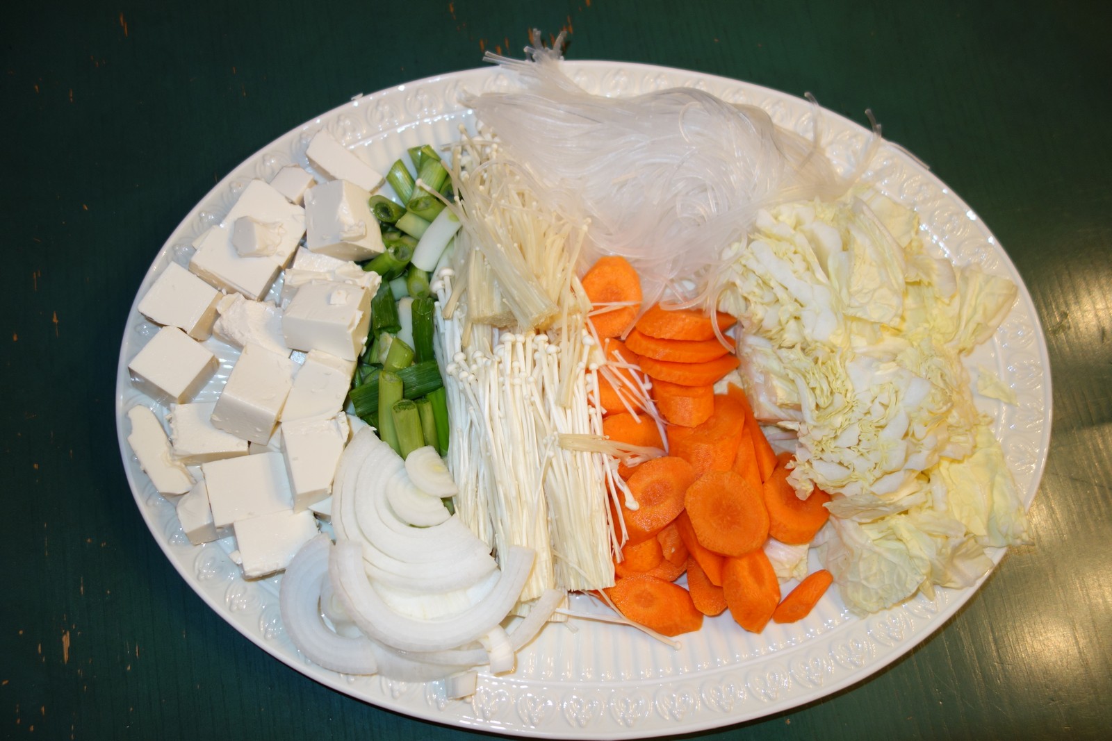 Here's how we prepare the vegetables and noodles for cooking.