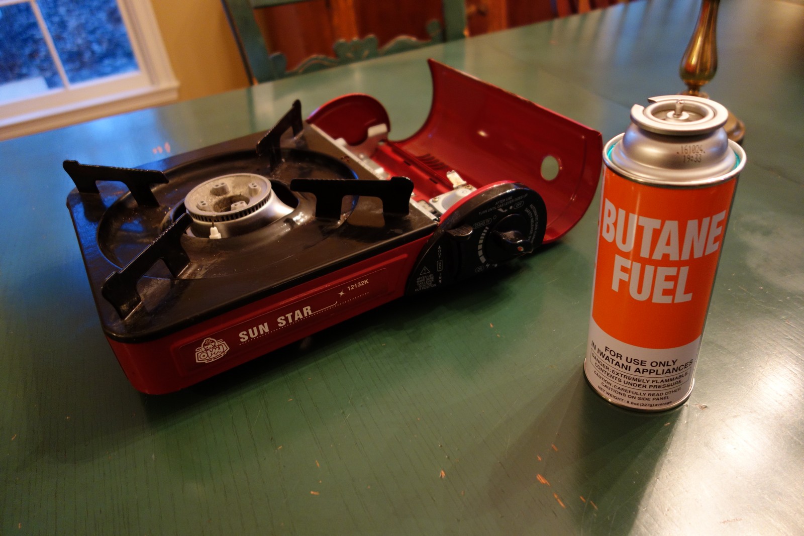 Many Asian markets sell these little butane burners, which are ideal for cooking at the table.