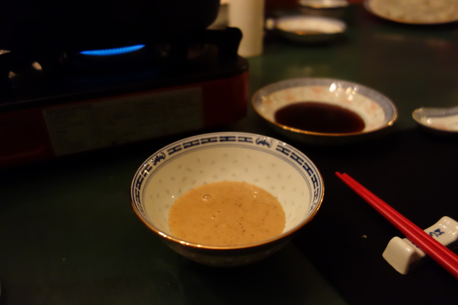 Each person should have a bowl with Sesame sauce (front) and a bowl with Ponzu sauce (rear) for dipping.