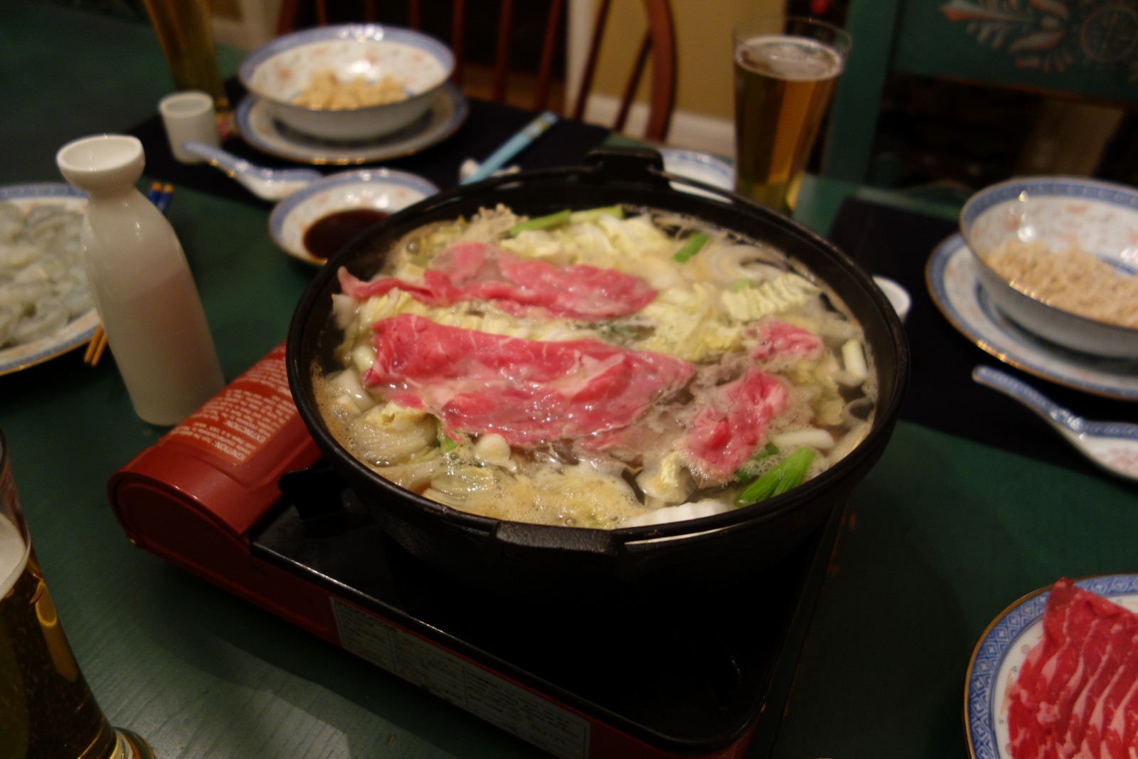 Everyone can have their own piece of meat cooking at the same time. There is occasional confusion over whose is whose, usually accompanied by chopstick swordfights and more beer.