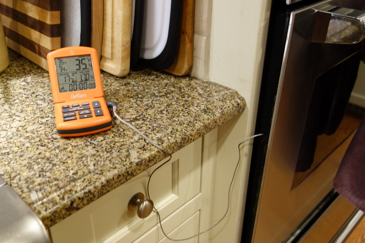 The ChefAlarm hard at work monitoring Rosemary-Lemon Chicken in the oven. Chicken started at 35F, but needs to come off (for dark meat) about 175F. I set the alarm for 170F to give me time to check different pieces with my Thermapen MK4.