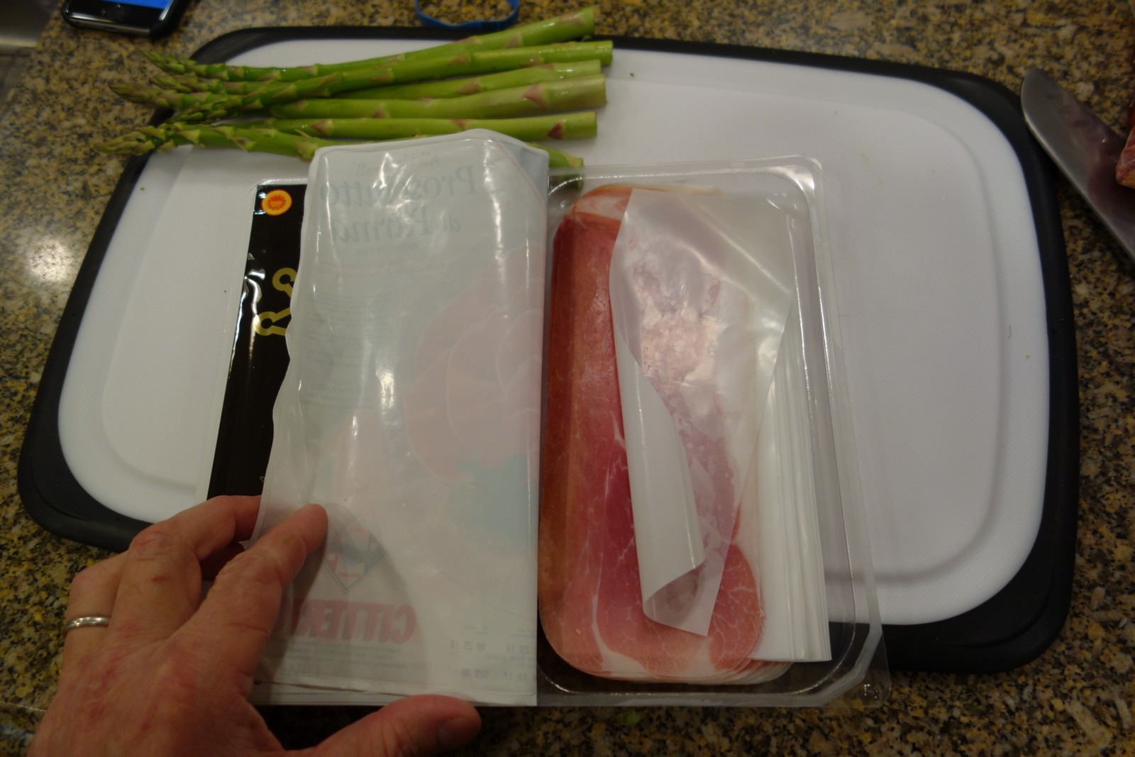 Prosciutto comes pre-sliced, extremely thin. The slices are typically separated by wax paper. 