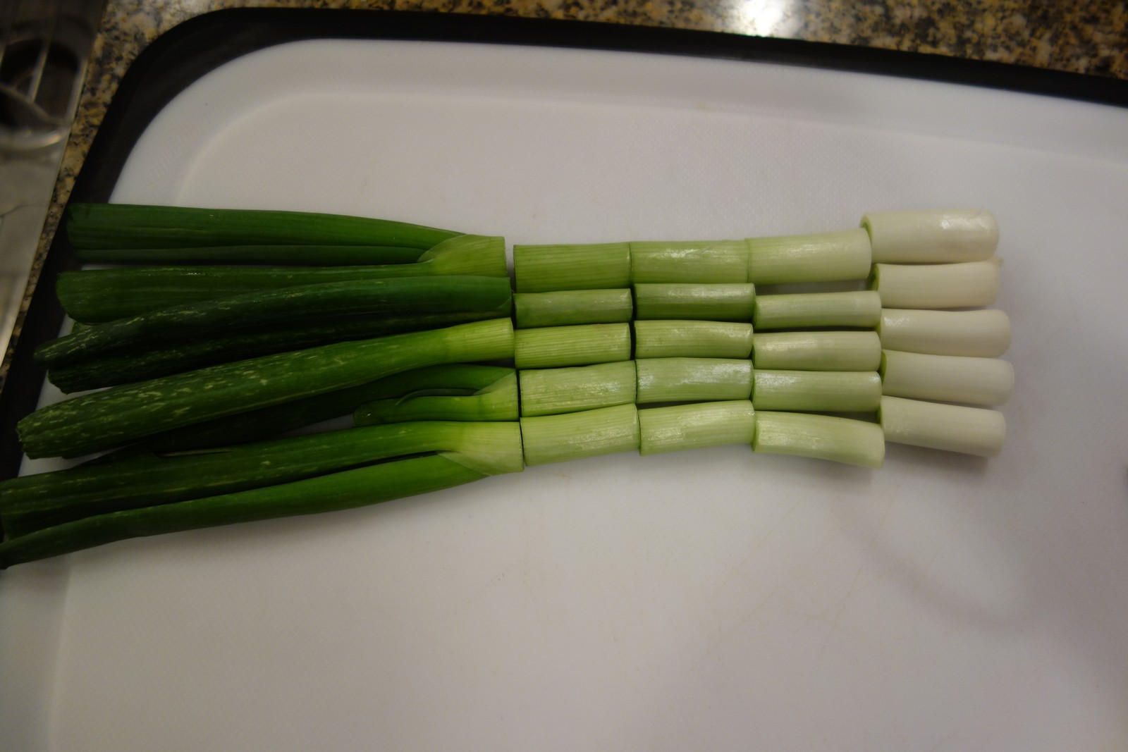 Clean and chop the onions. Discard the green leafy portion - it wilts too much if you grill it.