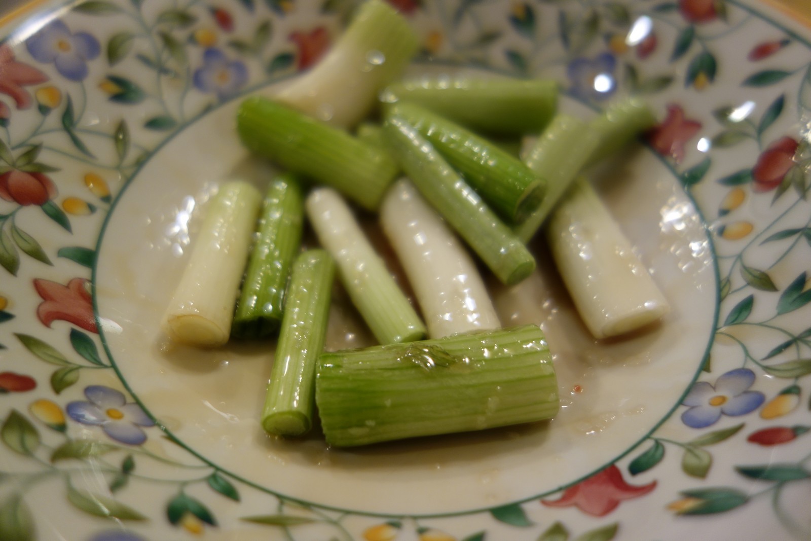 Toss the onions in sesame oil and sprinkle with salt.