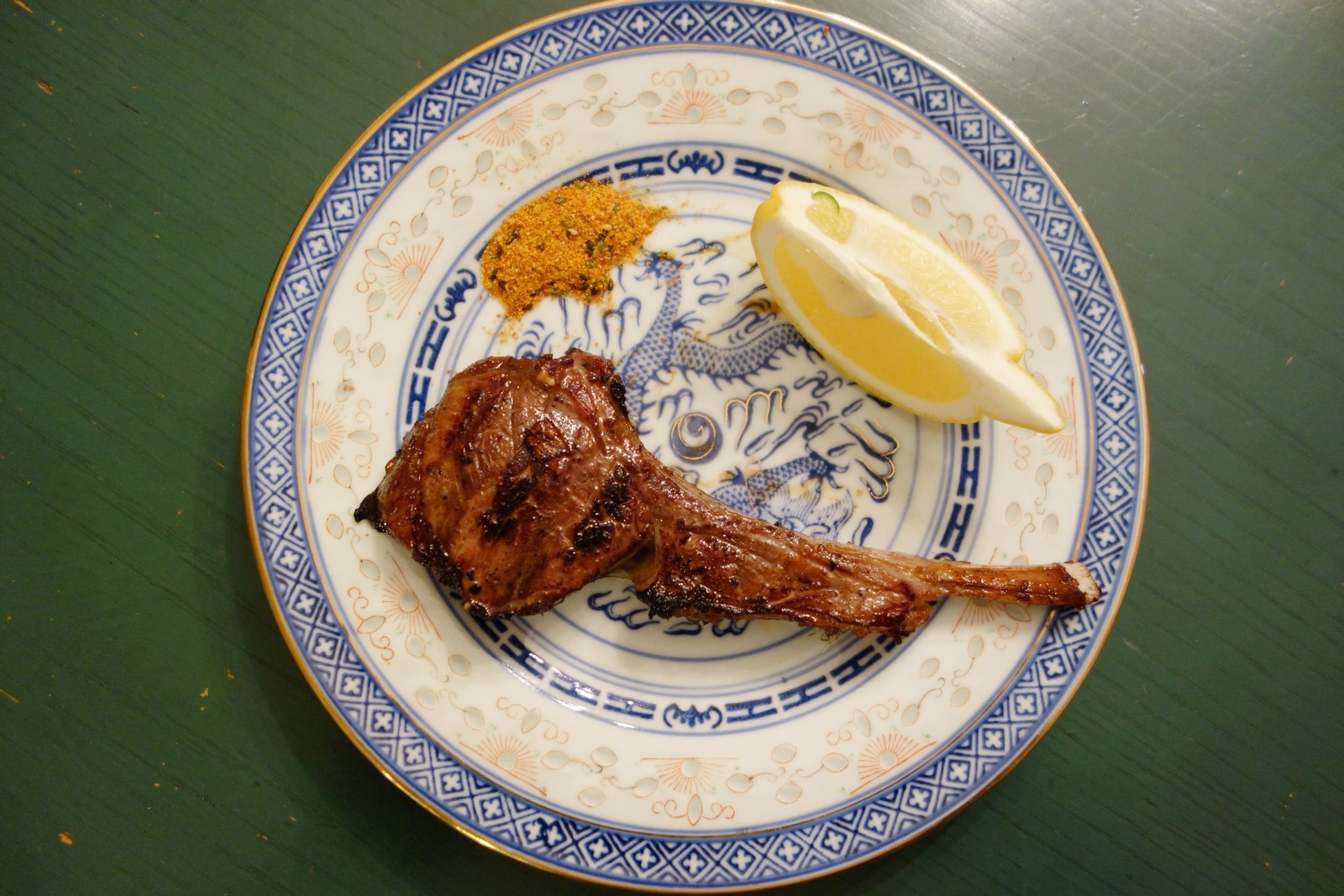 Marinated lamb chops served with a slice of lemon and Togarashi spice. Delicious!