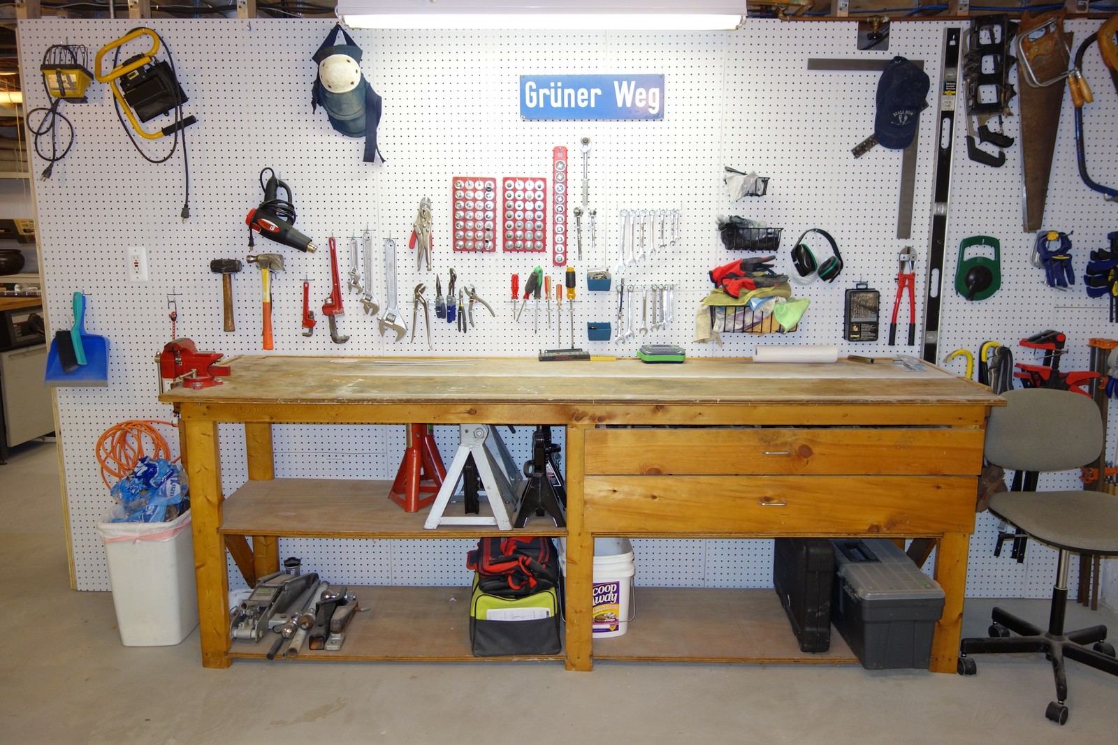I used to store all of my tools in the drawers within the workbench, but would have to dig through each drawer to find them. HAving the tools on display on the wall makes finding and replacing them much faster.