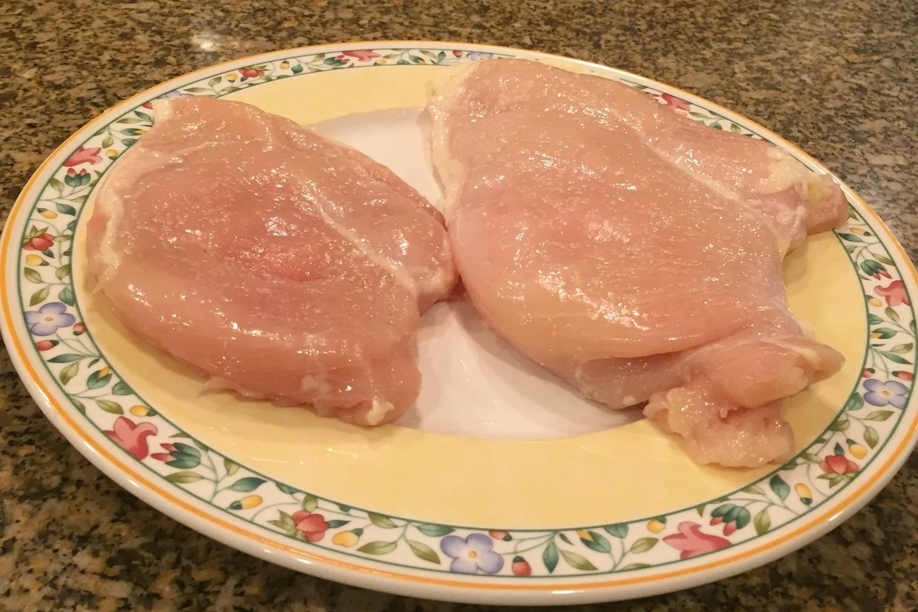 Dry Brined - Amish breast on the left, normal breast on the right. Just sprinkle with kosher salt on both sides, cover with saran wrap, and place in the refrigerator.