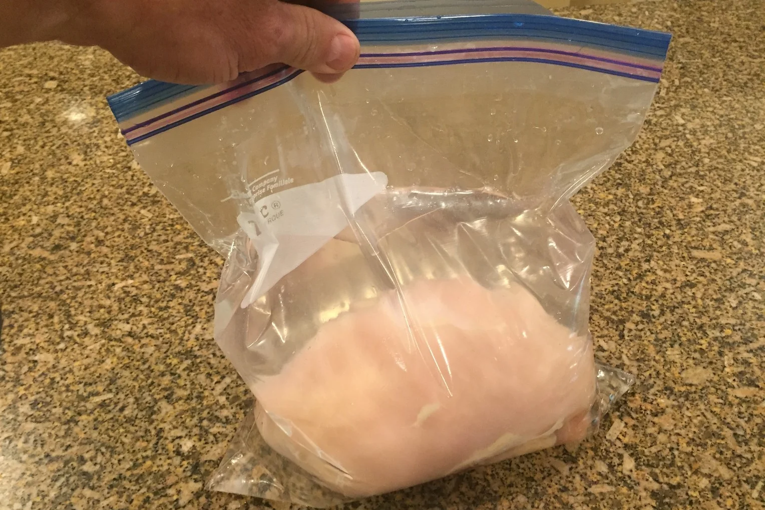 Wet brined - add salt and sugar to some water in a zip-loc bag, then refrigerate. I usually put the bag into a plastic container in case it leaks.