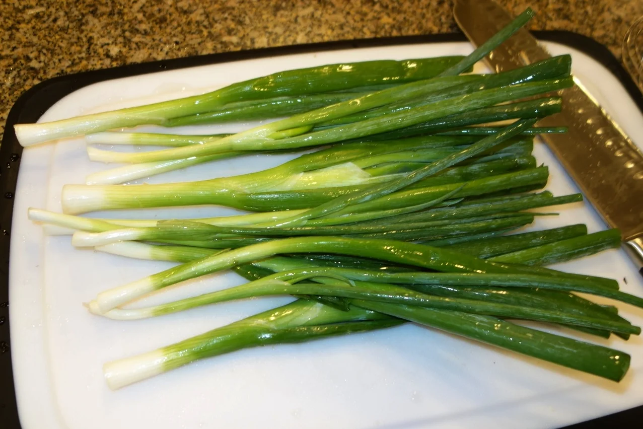 Clean the green onions.