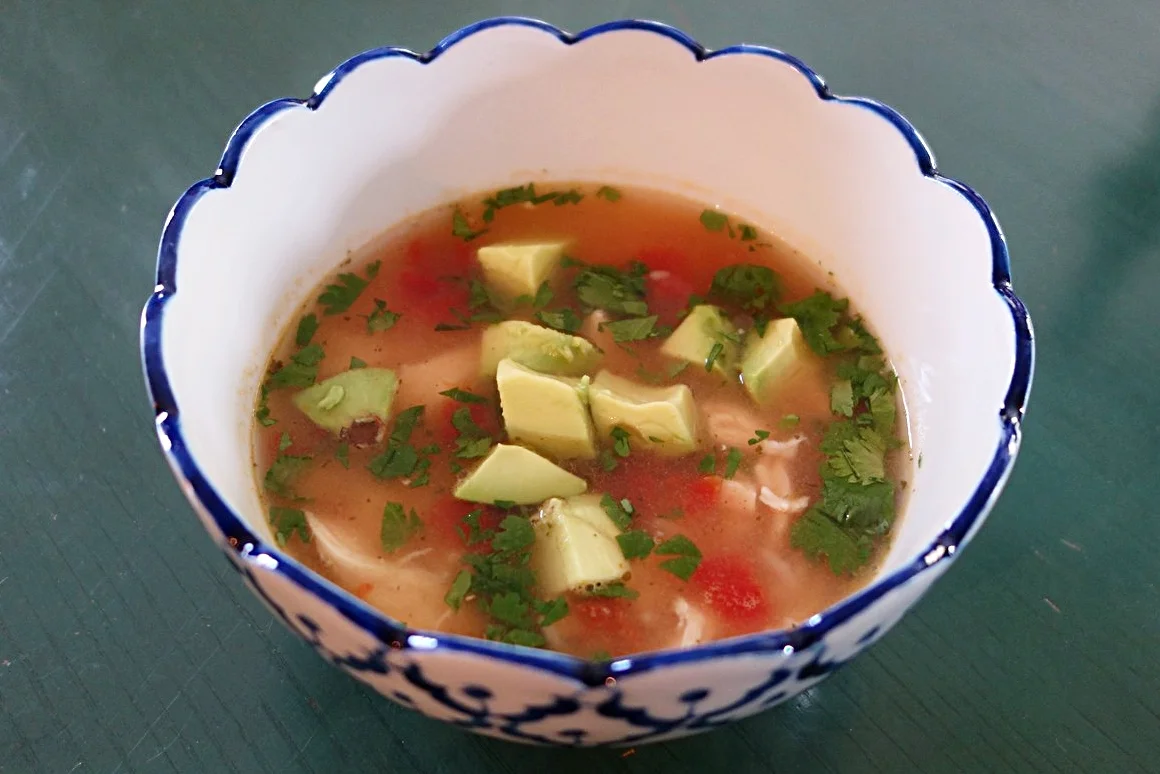 Topped with cilantro and sliced avocado, this soup is absolutely full of flavor.