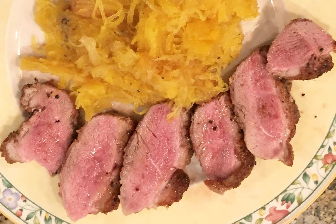 Oven vs. skillet? Here are some I cooked a week ago entirely in the skillet. You can see that the left sides (non-fat sides) have more gray area on the edge from being finished on the hot skillet. Overall they get pinker in the middle and more gray on the outside.